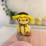 Adorable Crochet Baby Chick in a Sunflower Hat Amigurumi Pattern