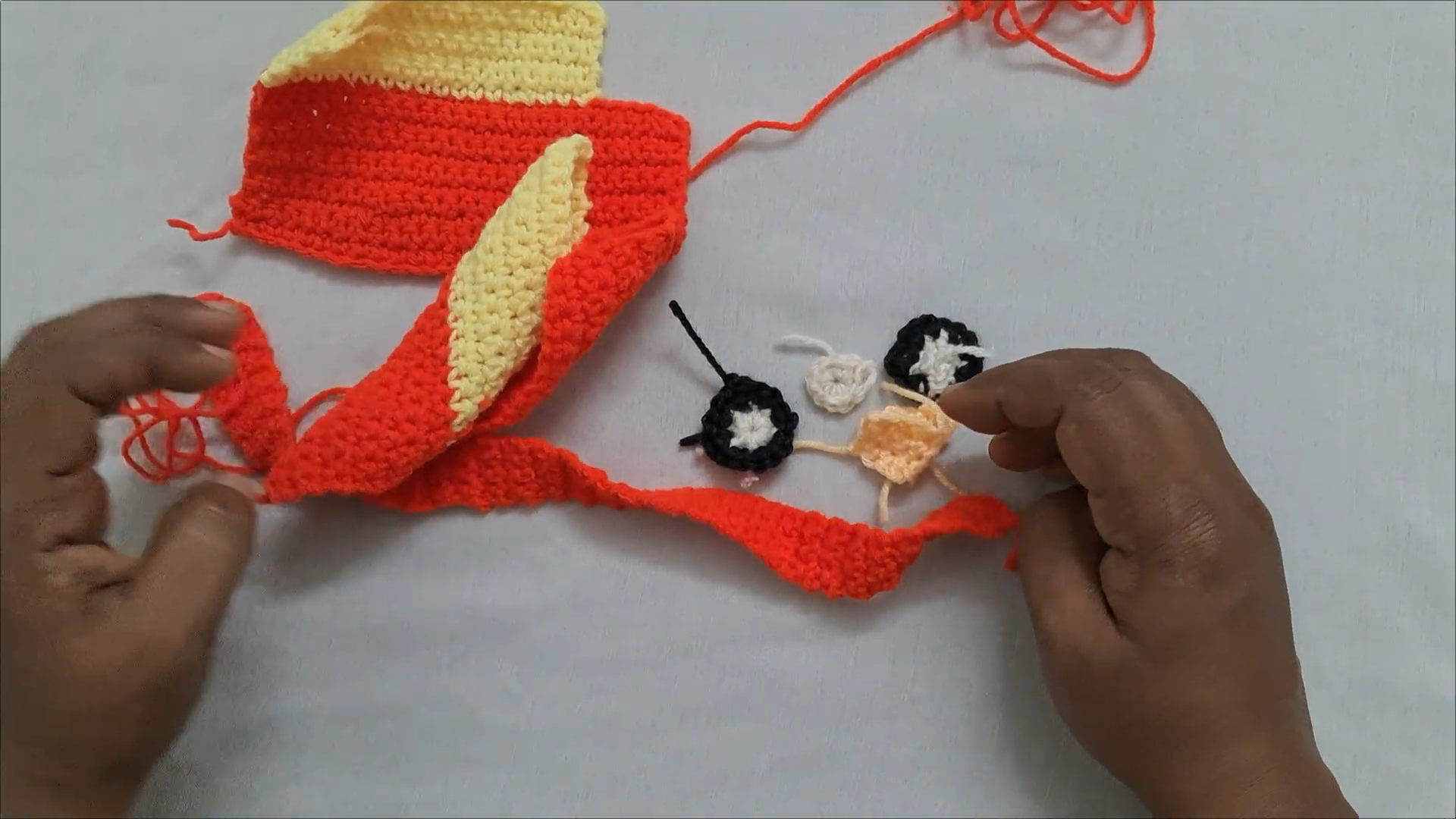 Crochet wheel appliqués in black and white