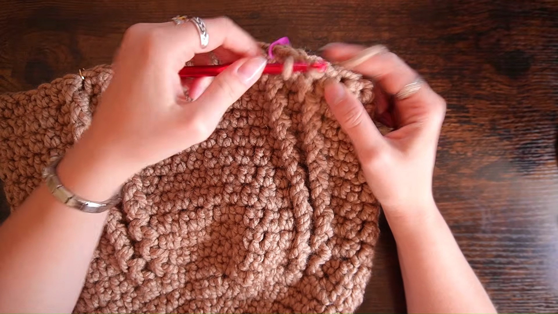 Crocheting sides of tan fawn shoulder bag