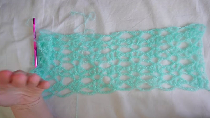 Lacy mint green crochet lace pattern swatch