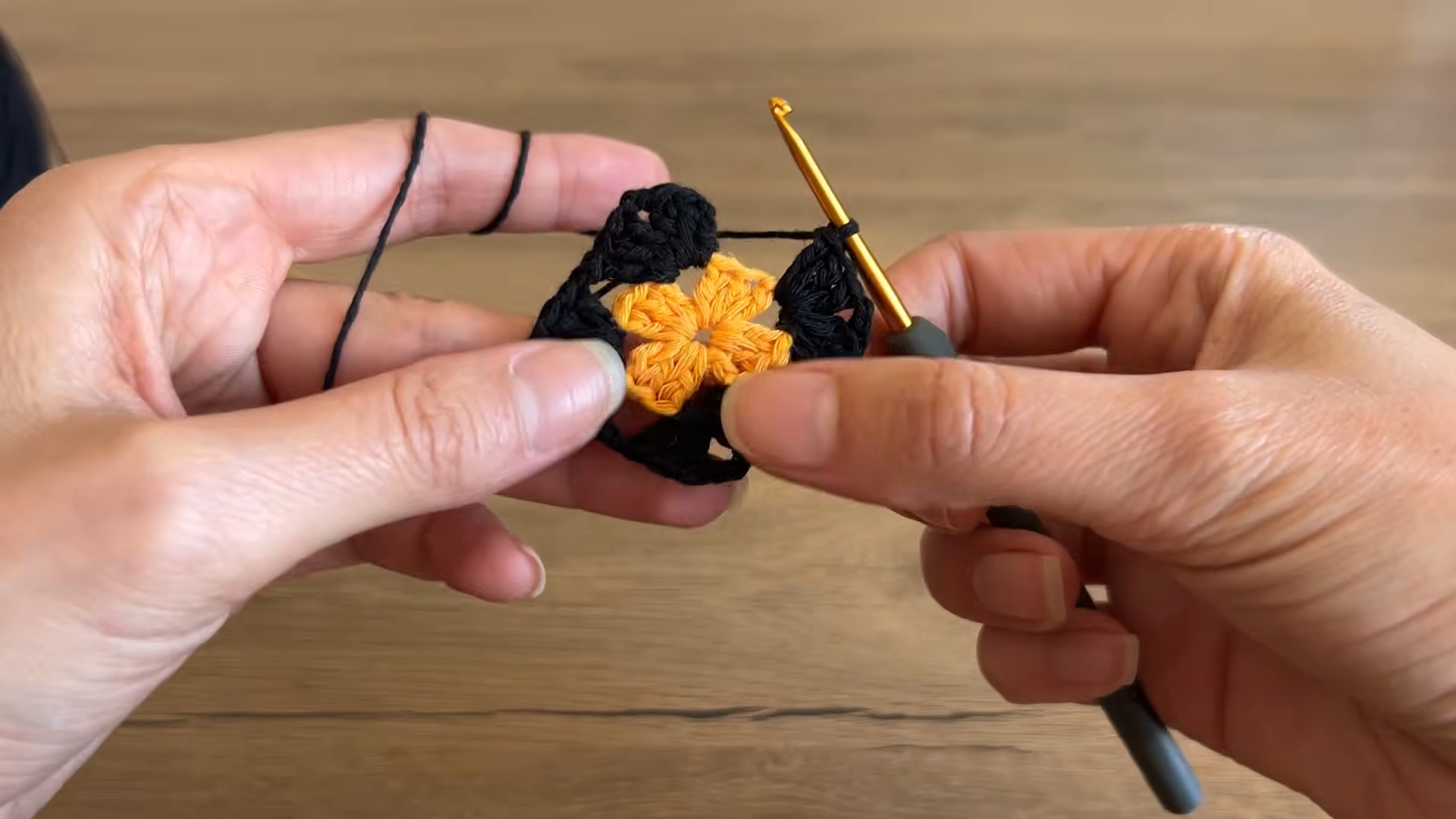 Bright orange round over the black layer