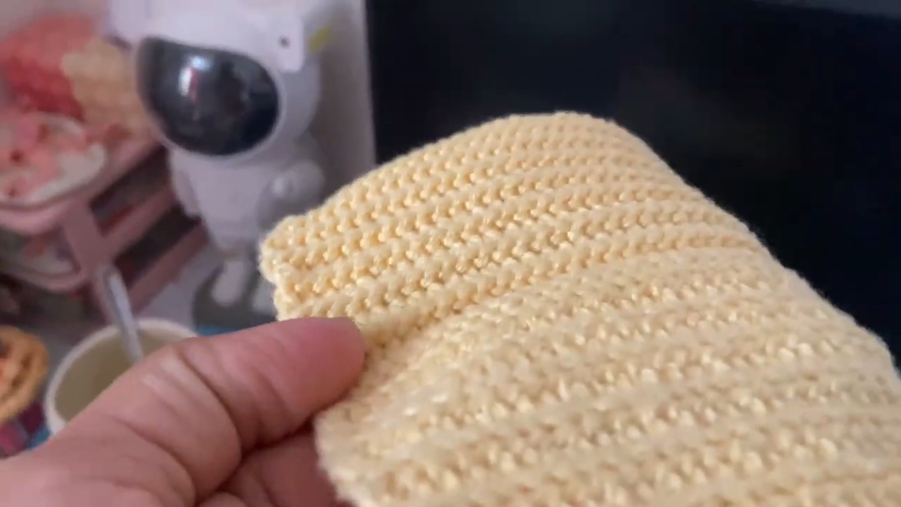 Close-up of ribbed crochet stitches on baby doll top