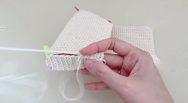 Joining bag panels together with stitch markers in place