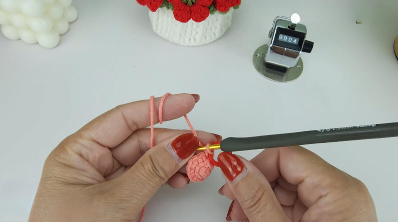 Peach small crochet ball R4-R6 round, counter at 4.