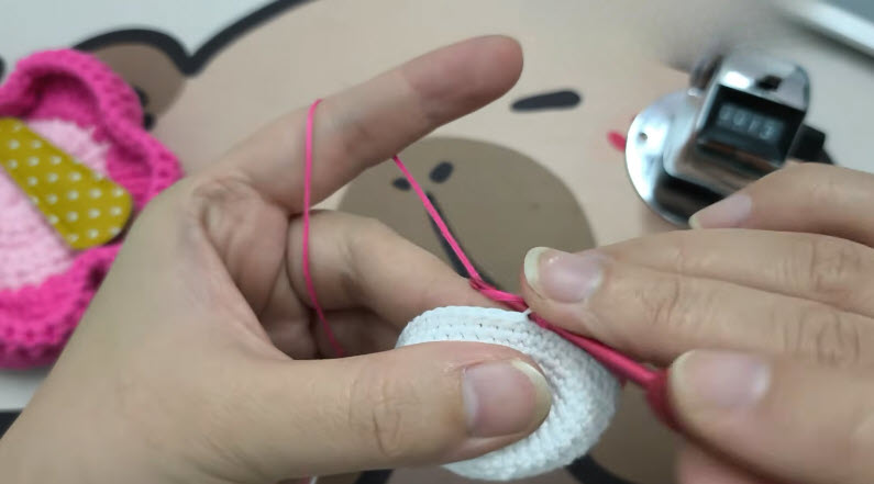 Pink yarn joined in back loops