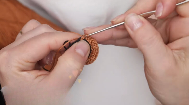 Row 5 back loop half double crochet increase for eye shape