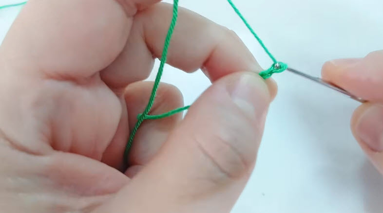 Starting chain foundation for green crochet flower earring