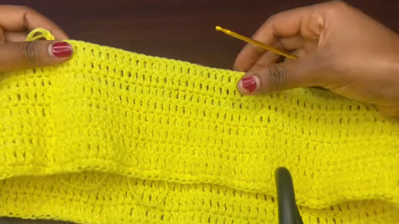 Wide yellow body panel for crochet strappy booty shorts
