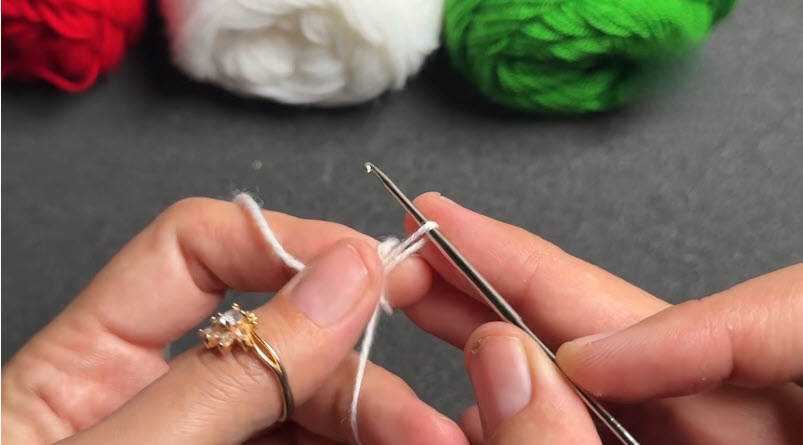 Working half double crochet stitches for Christmas bracelet band