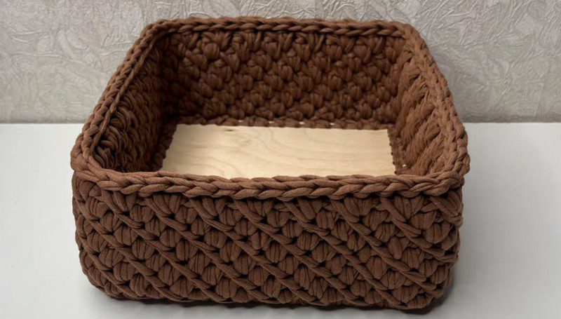 Finished square crochet makeup basket with a diagonal textured stitch pattern.